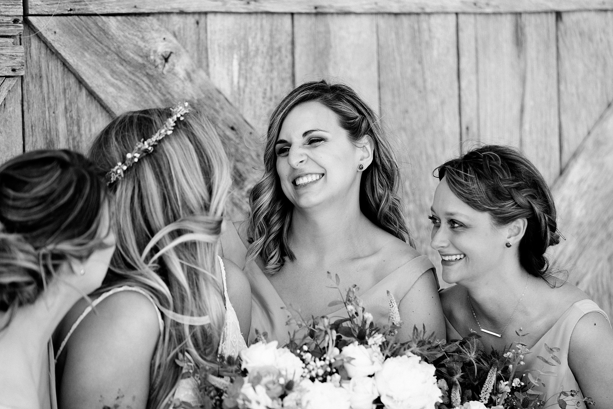 A sunny spring wedding at Shanahan’s Barn in Charlevoix, Michigan by Breanne Rochelle Photography.
