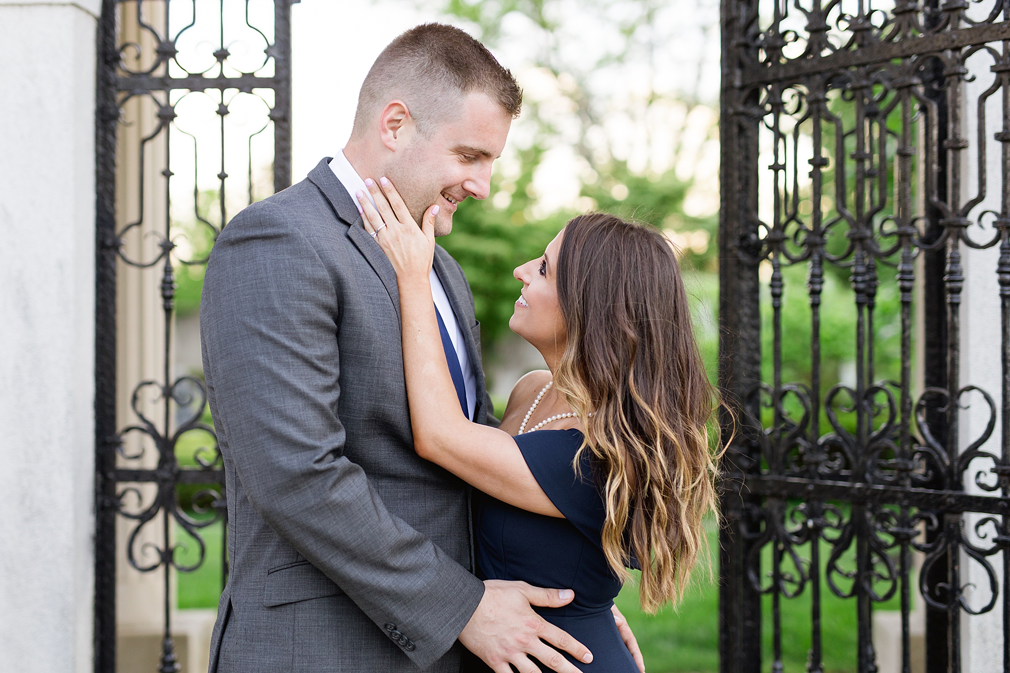 An elegant early summer War Memorial engagement session with an adorable German Shepherd puppy in Grosse Pointe by Breanne Rochelle Photography