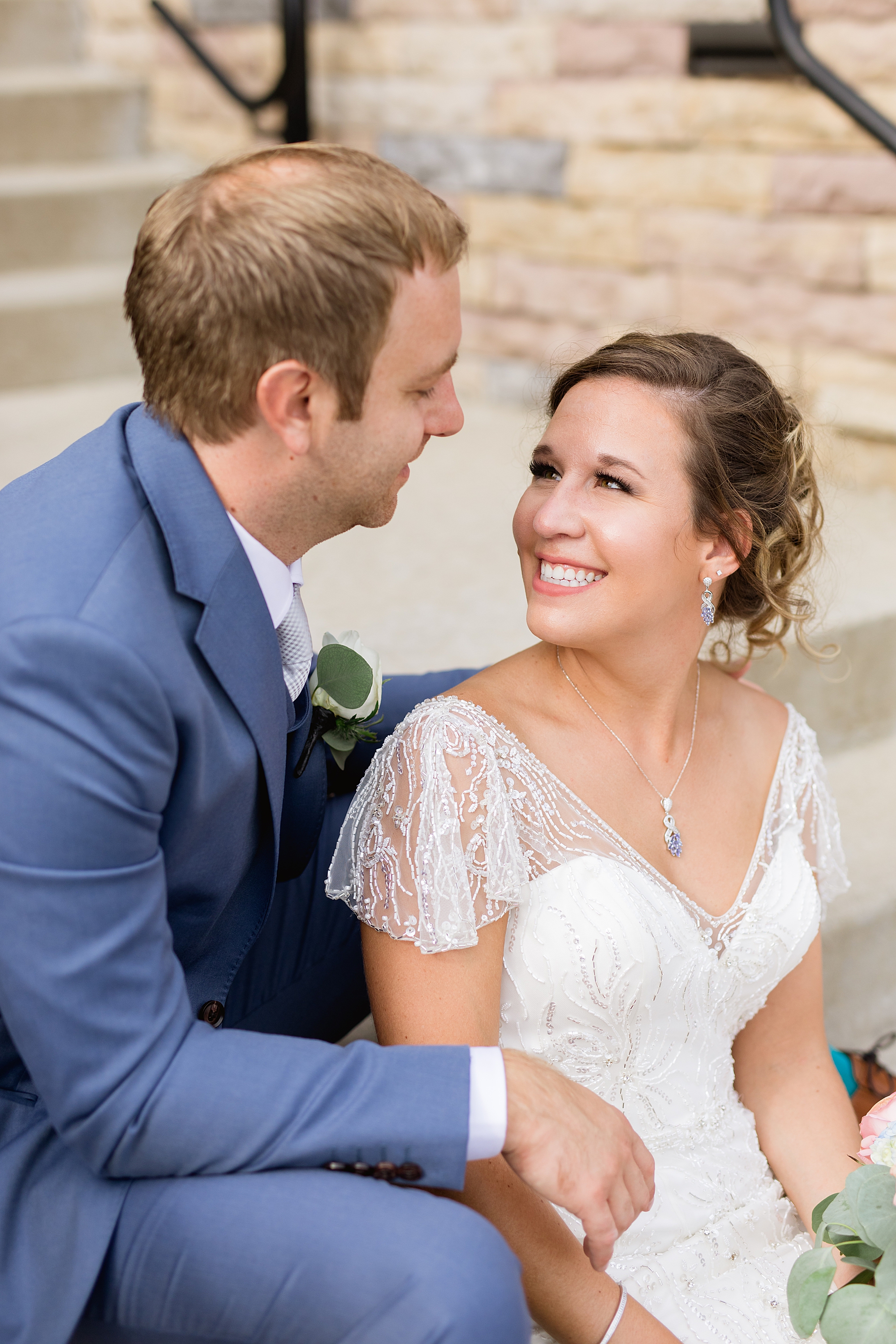 A romantic summer wedding along the blue waters of Lake Michigan at the Inn at Harbor Shores in St. Joseph, Michigan by Breanne Rochelle Photography. 