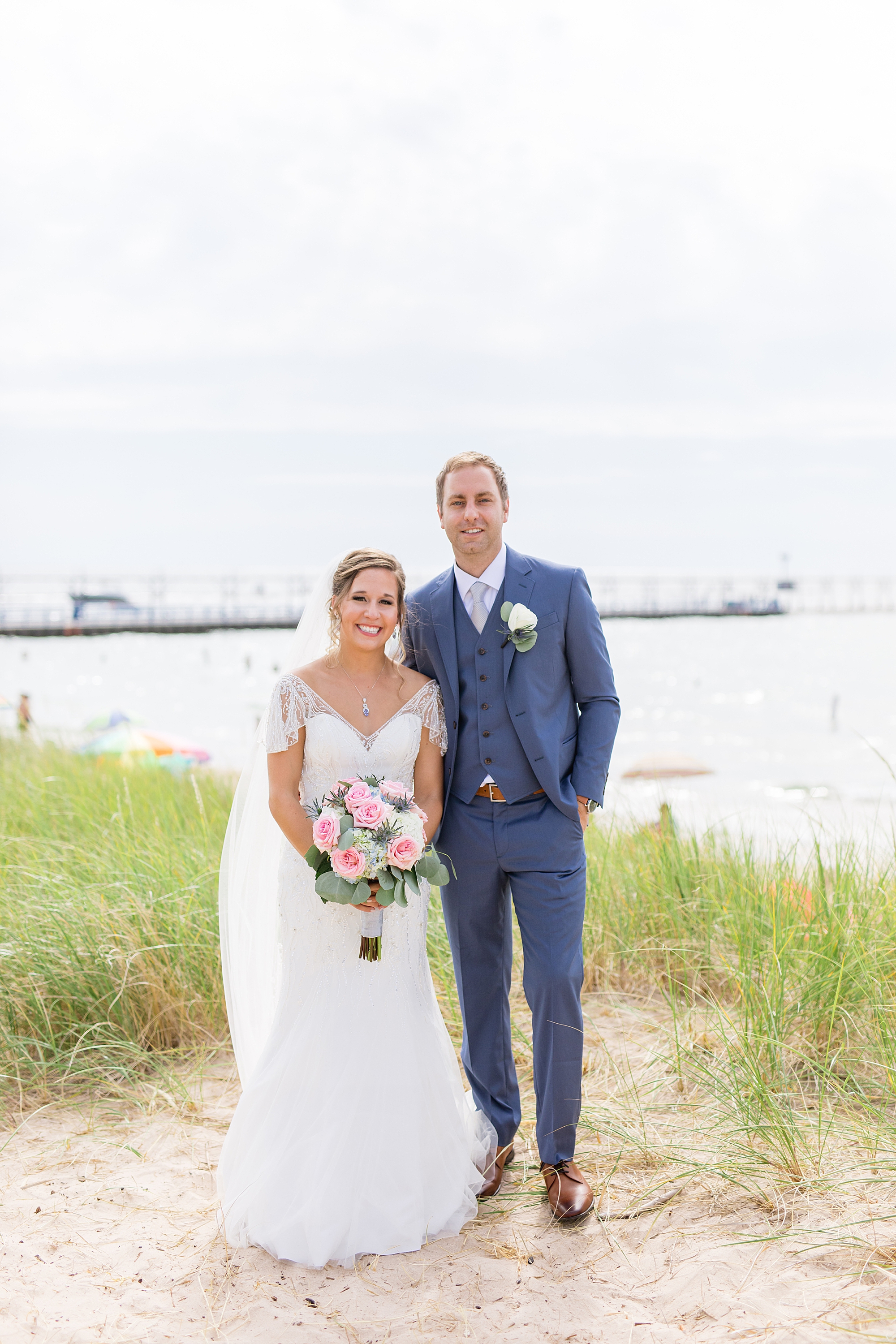 A romantic summer wedding along the blue waters of Lake Michigan at the Inn at Harbor Shores in St. Joseph, Michigan by Breanne Rochelle Photography. 