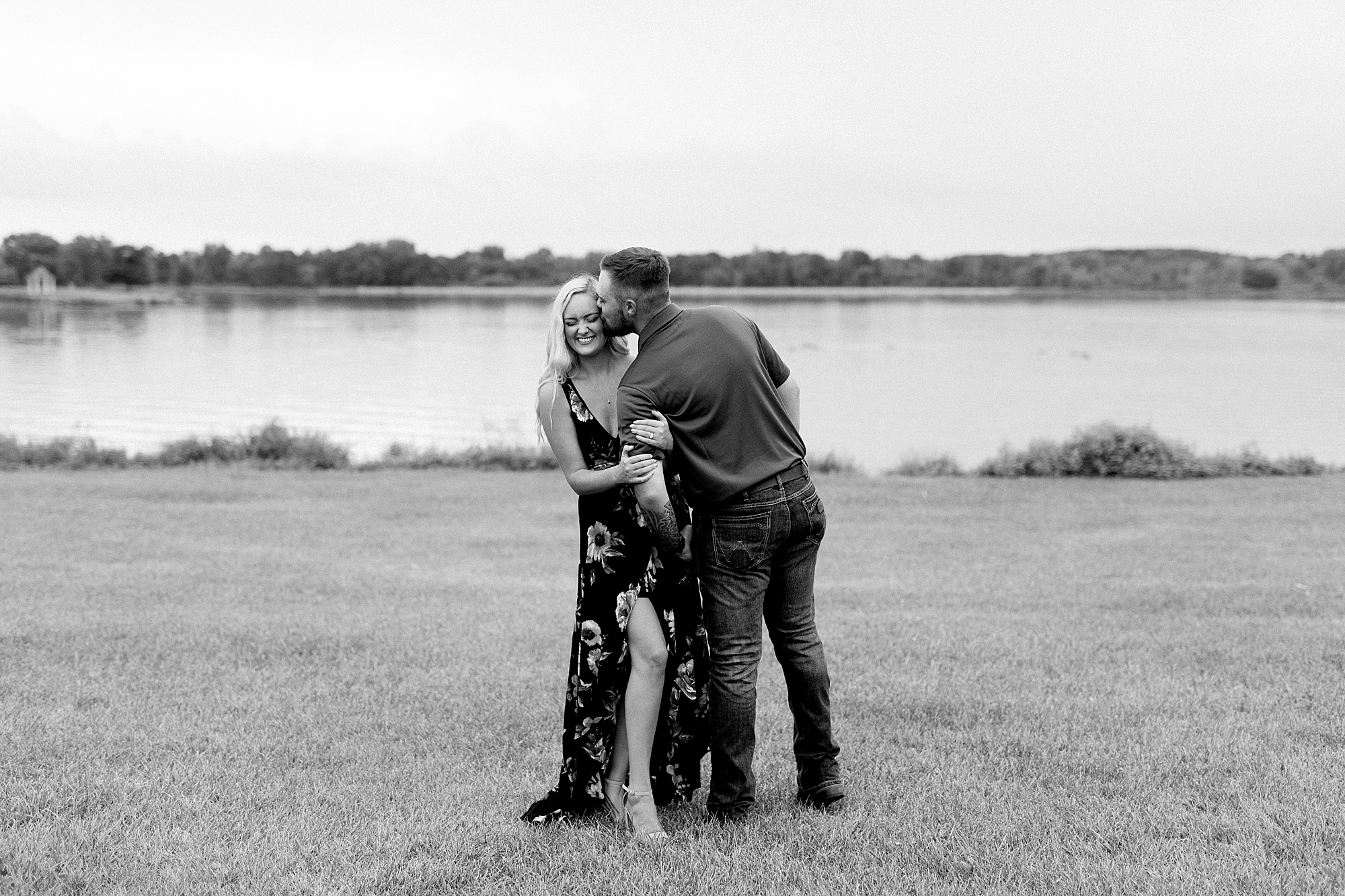 A late summer engagement at Stony Creek Metropark in Michigan with stormy skies by Breanne Rochelle Photography.