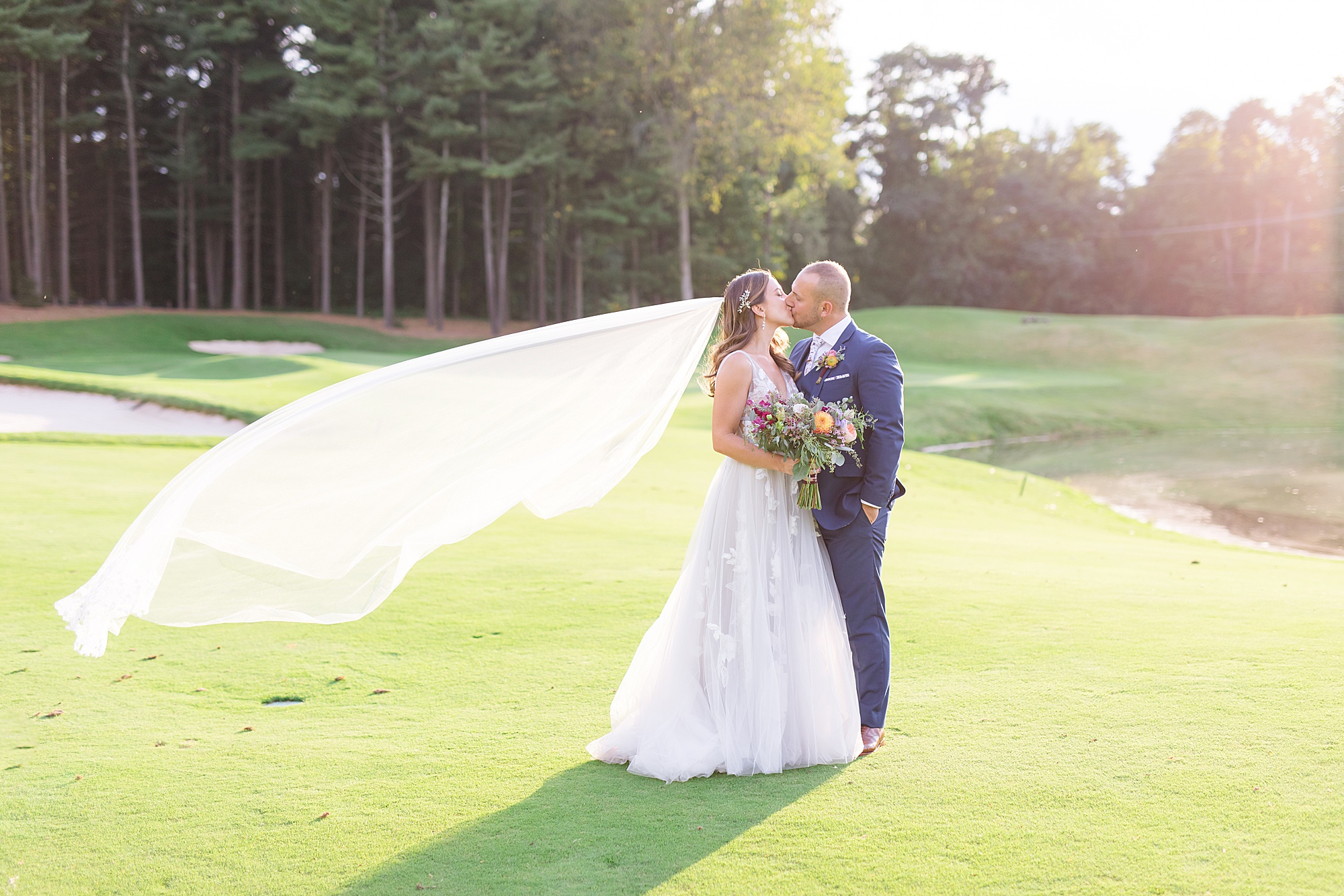A romantic lavender, blush, and French blue late summer wedding at Shepherd’s Hollow Golf Club in Clarkston, Michigan by Breanne Rochelle Photography.