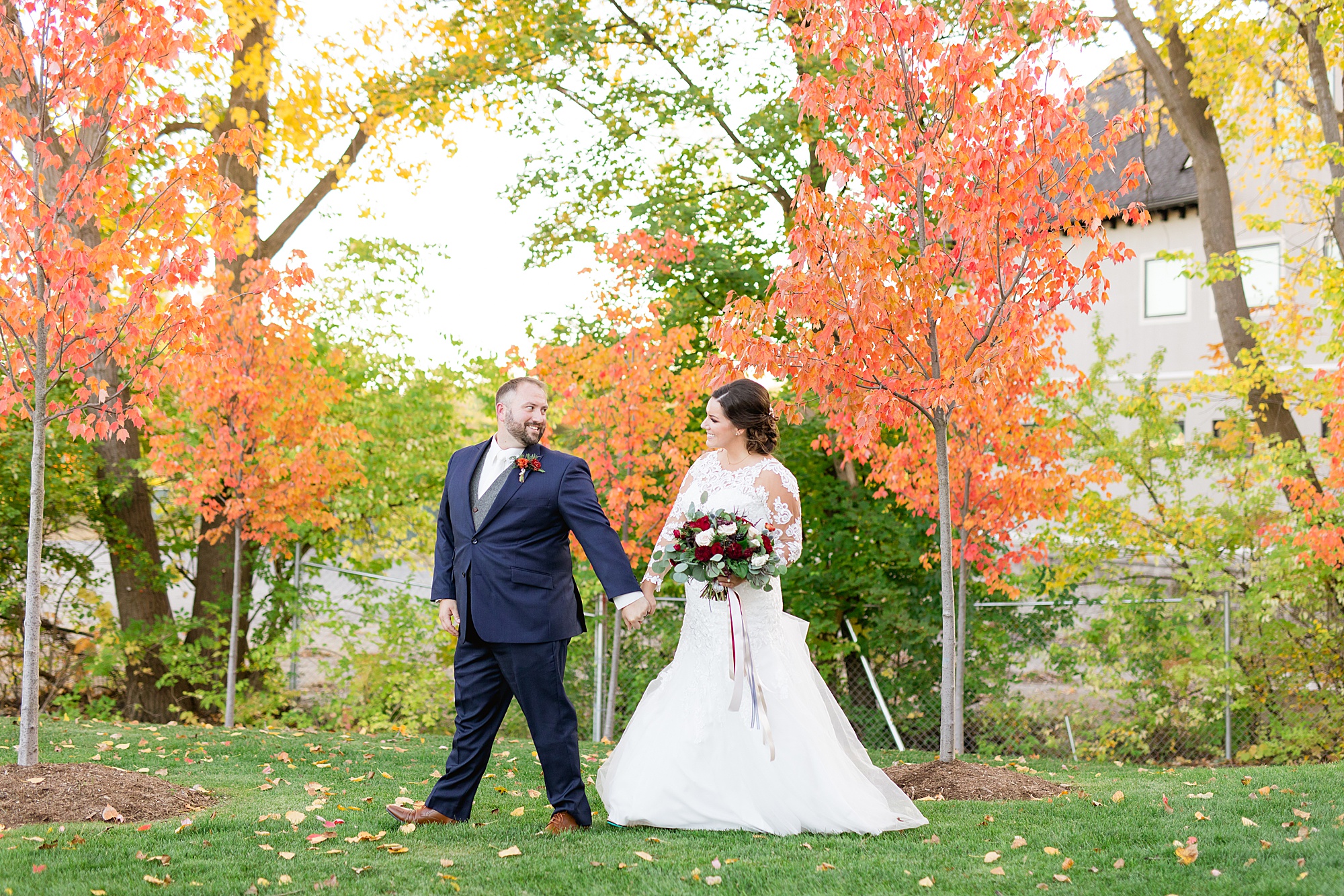 A classic Fall burgundy and navy Meadow Brook Hall wedding in Rochester, Michigan by Breanne Rochelle Photography.