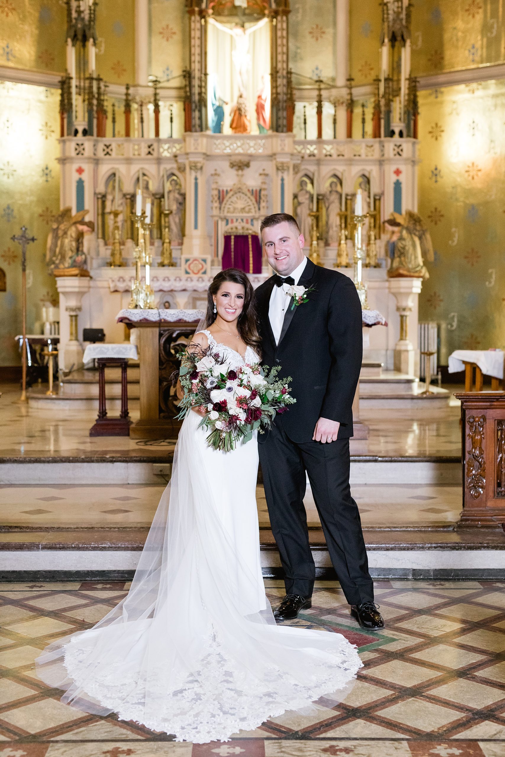 A classic burgundy and evergreen Christmas wedding at the Colony Club Detroit by Breanne Rochelle Photography.