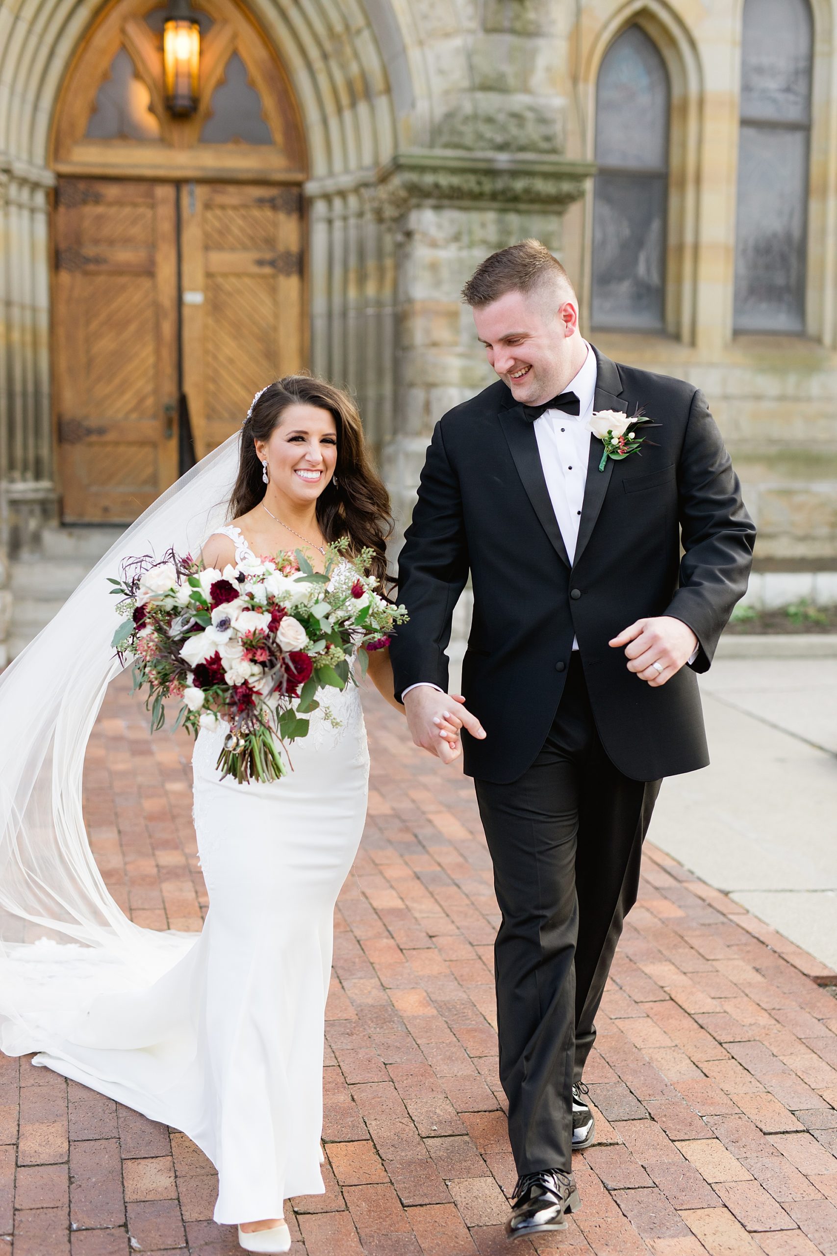 A classic burgundy and evergreen Christmas wedding at the Colony Club Detroit by Breanne Rochelle Photography.