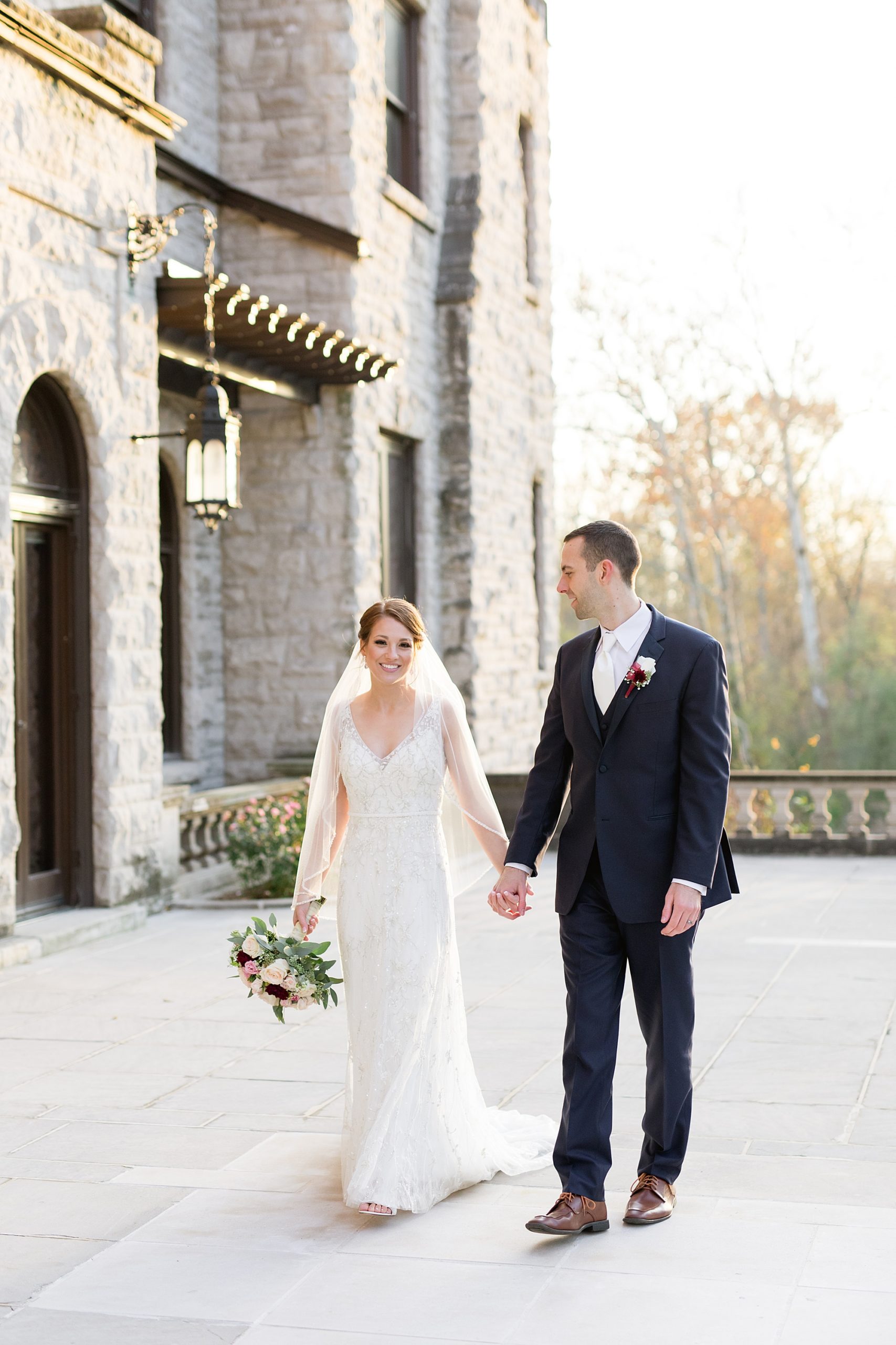 A classic navy and burgundy Fall Dearborn Inn wedding in Dearborn, Michigan by Breanne Rochelle Photography.
