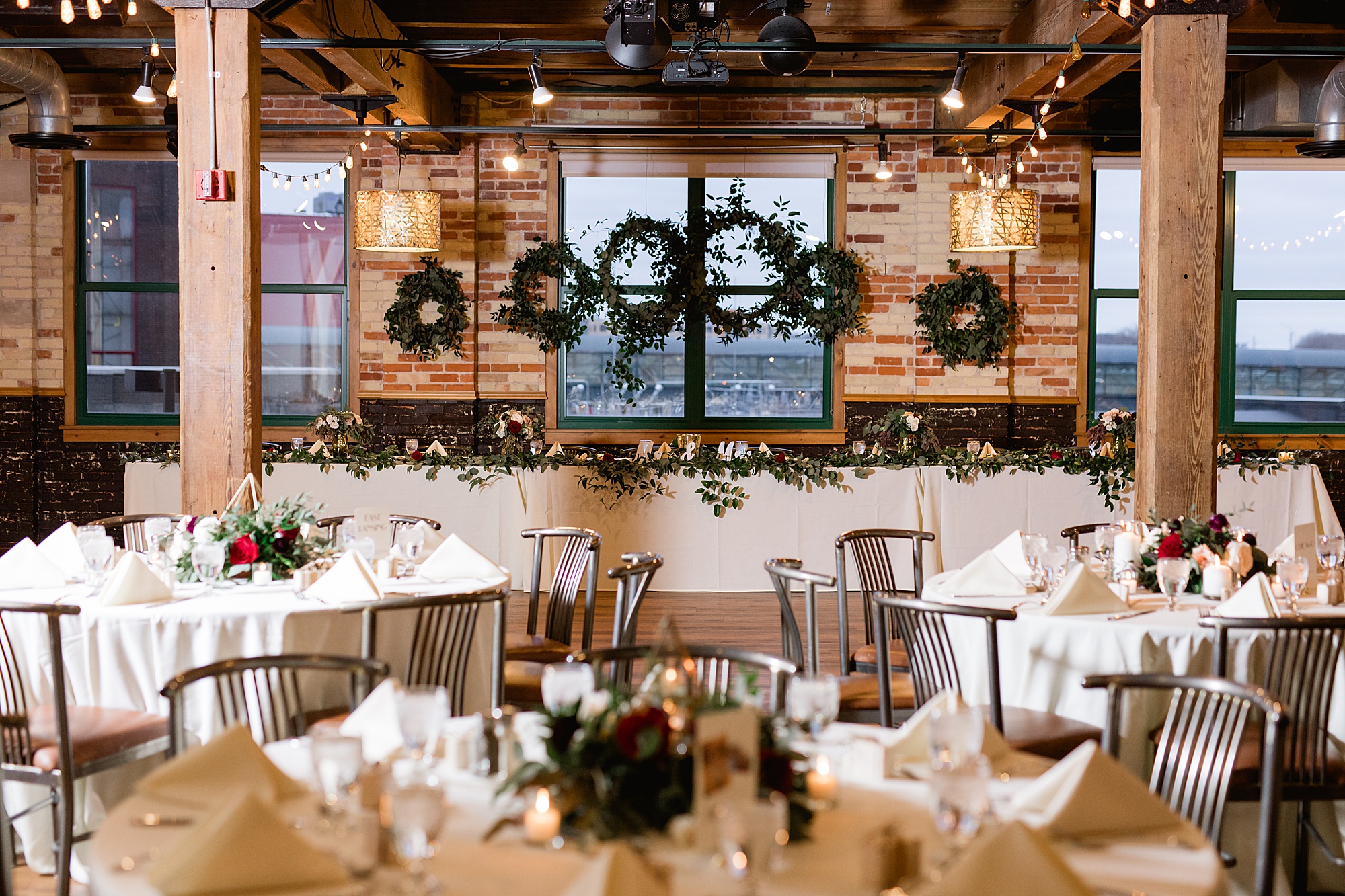 A romantic wintertime Downtown Grand Rapids wedding filled with cream and burgundy flowers by Breanne Rochelle Photography.