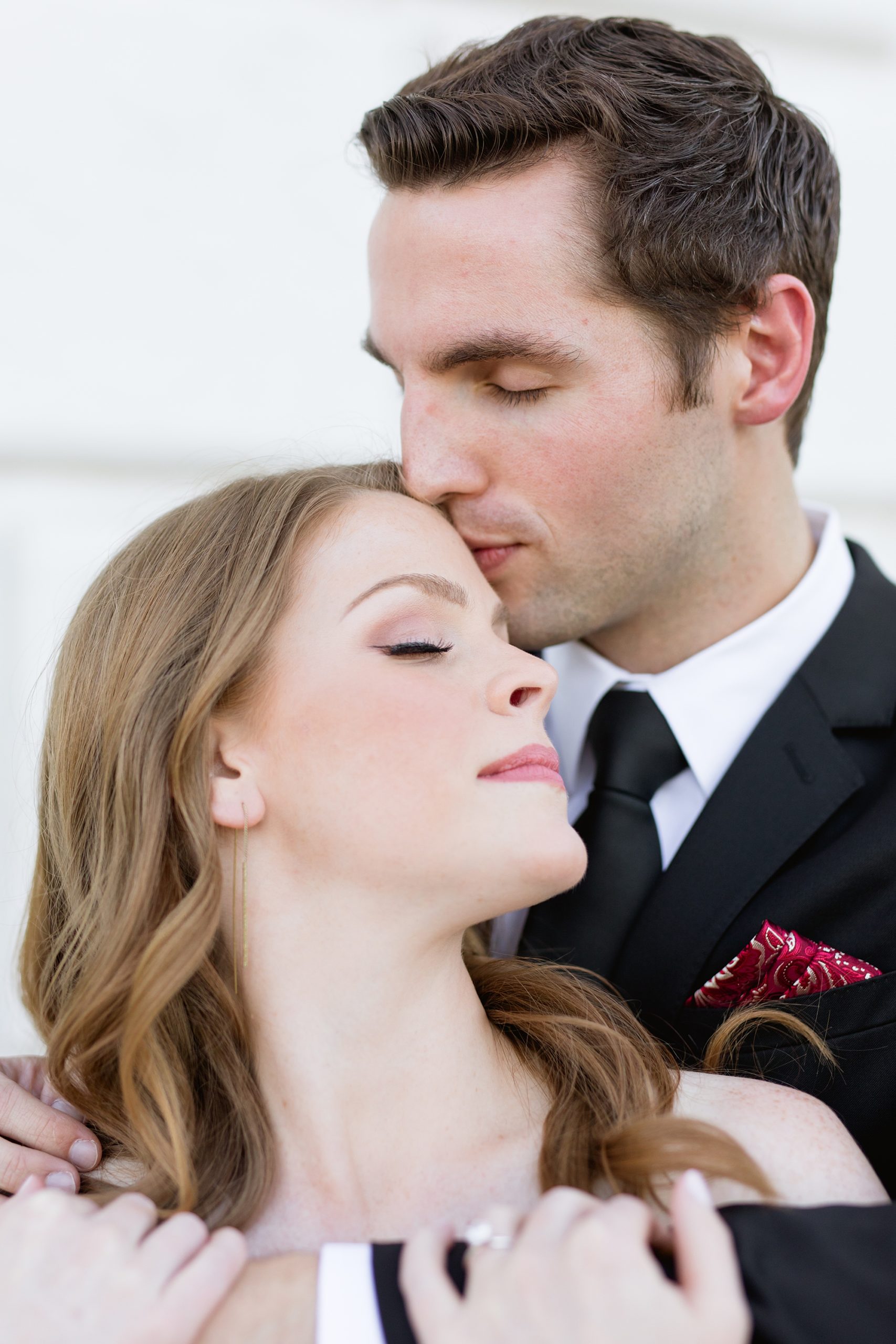 Kissing forehead pose for engagement photo | Breanne Rochelle Photography