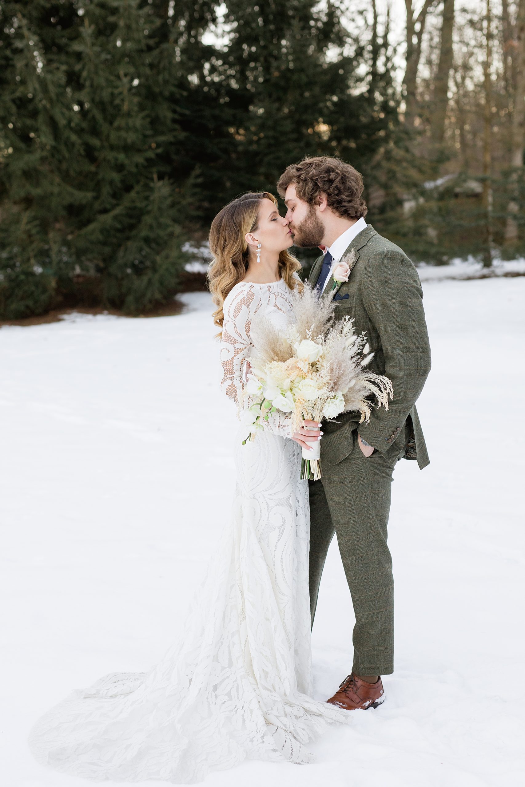 An elegant and intimate snowy winter wedding in Metro Detroit, Michigan by Breanne Rochelle Photography.