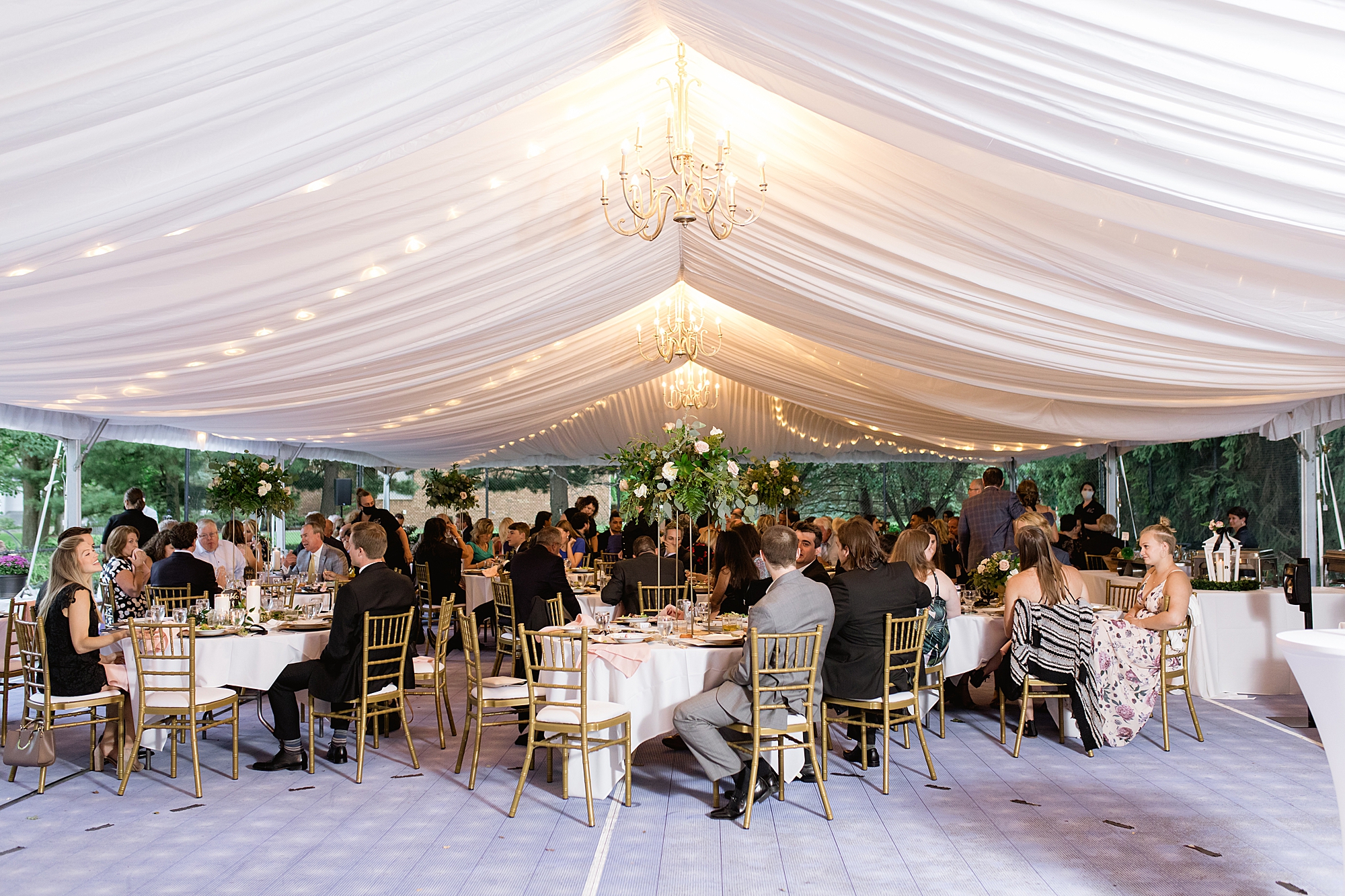 A classic late summer tented wedding at a family's private residence captured by Michigan wedding photographer Breanne Rochelle Photography.