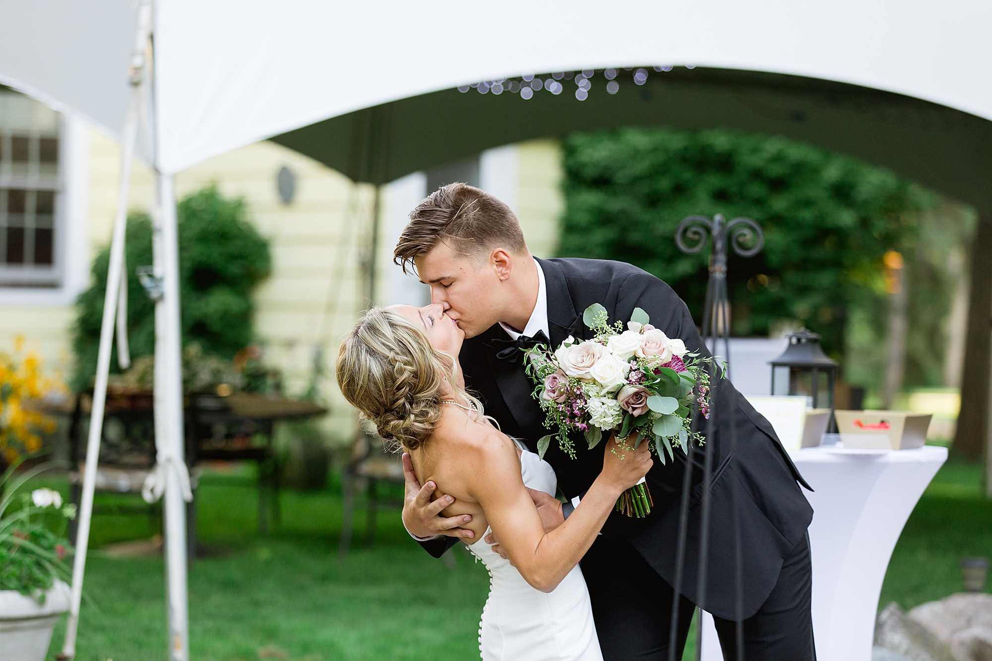 A classic late summer tented wedding at a family's private residence captured by Michigan wedding photographer Breanne Rochelle Photography.
