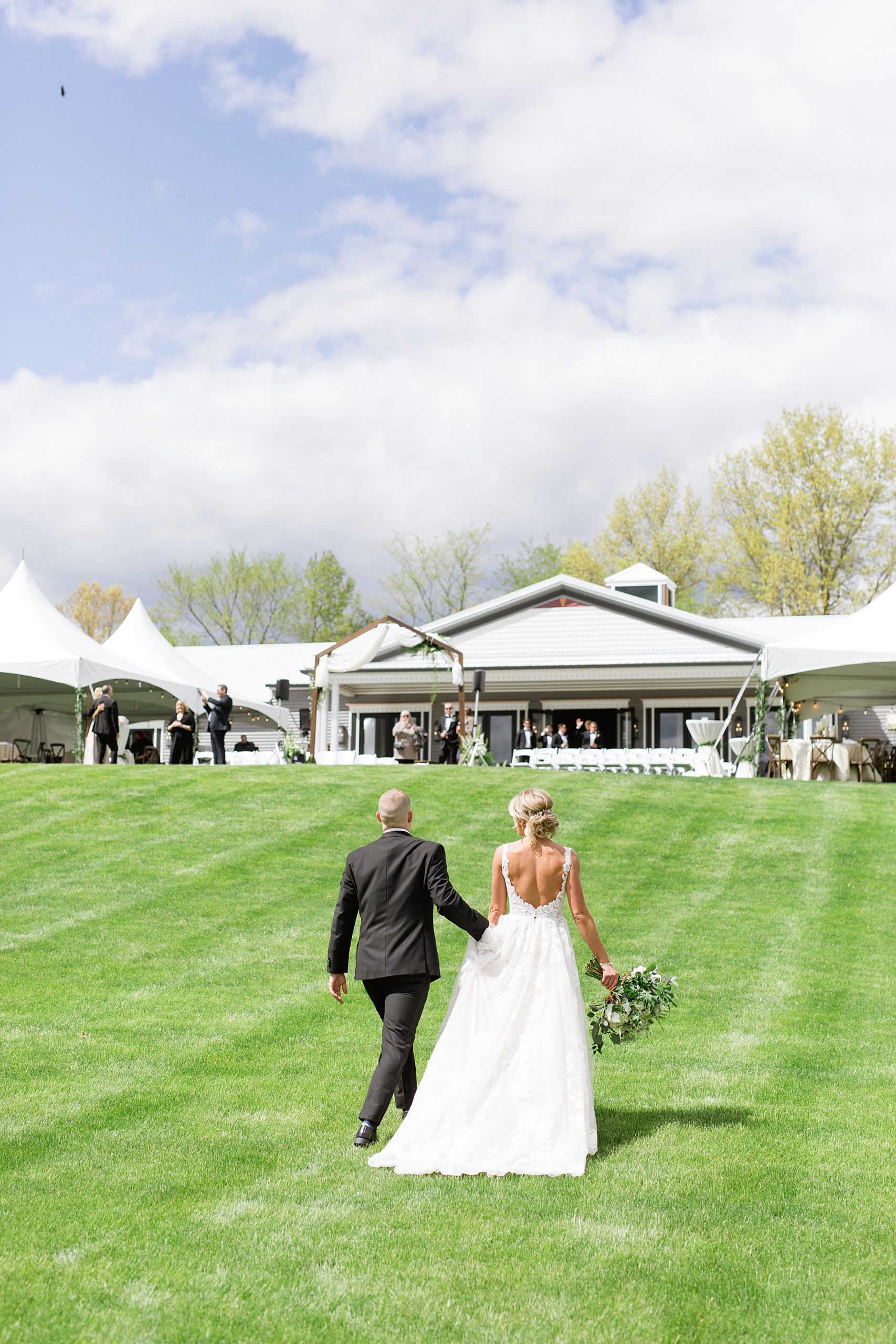 A romantic late Spring wedding at The Oakley in Holly, Michigan by Breanne Rochelle Photography.