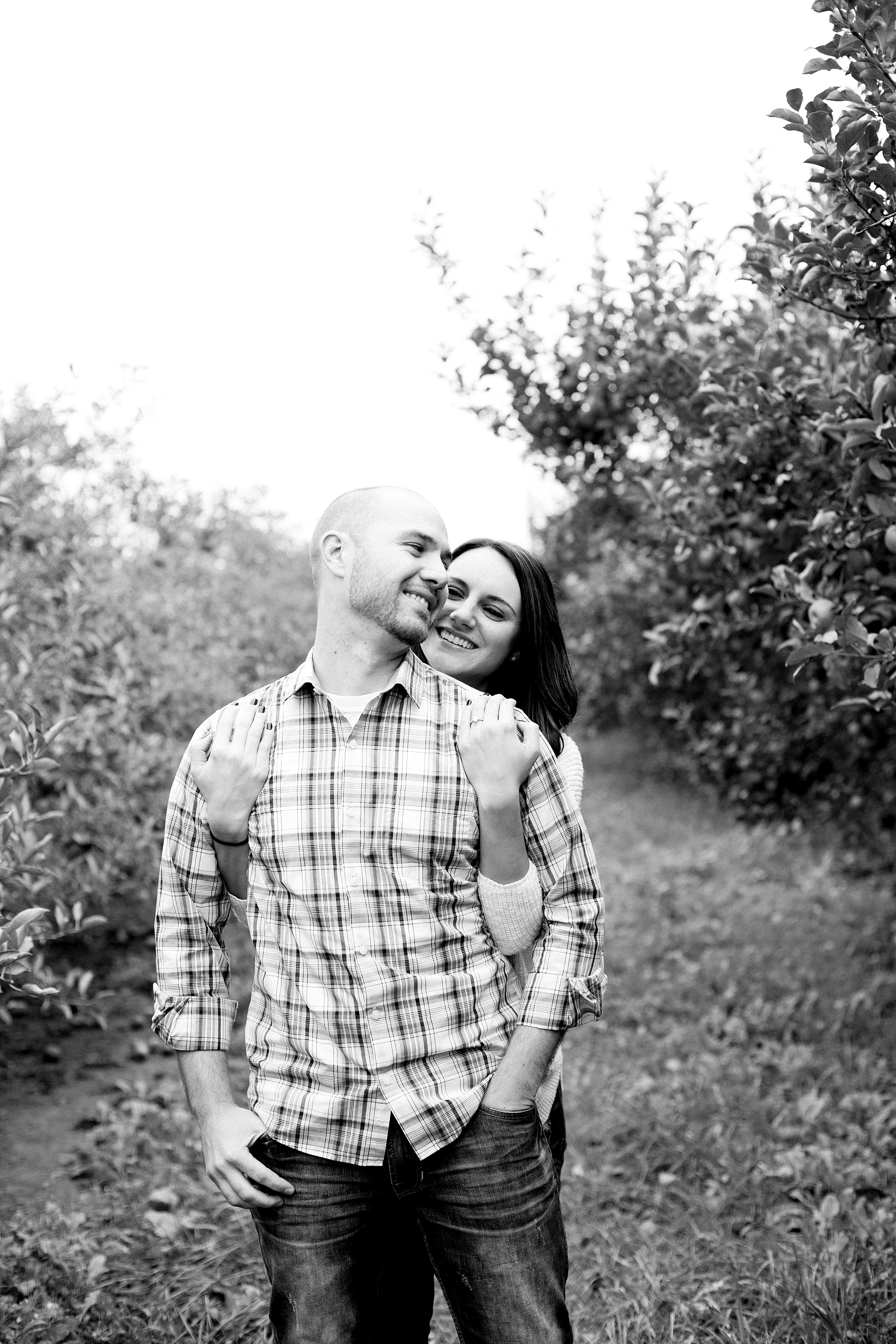 A Fall engagement session at the apple orchards in Michigan by Breanne Rochelle Photography. 