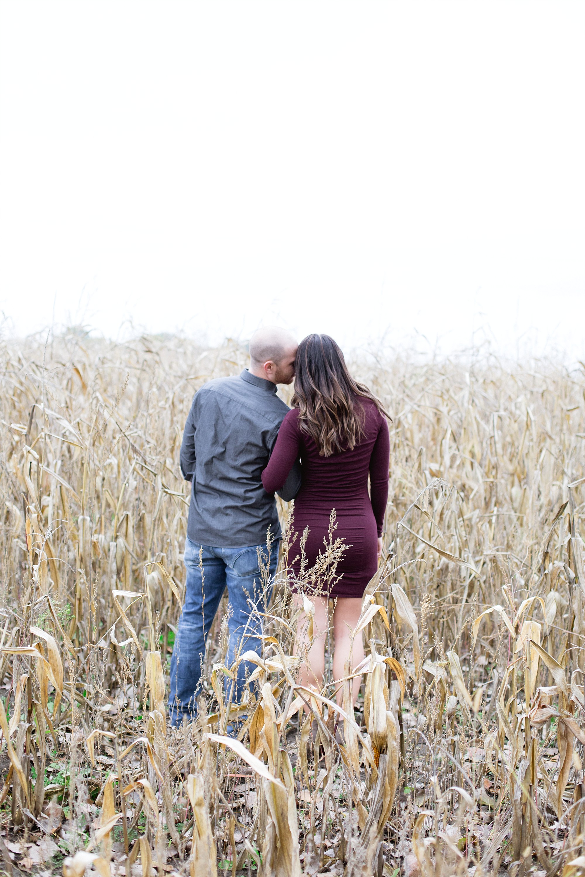 A Fall engagement session at the apple orchards in Michigan by Breanne Rochelle Photography. 