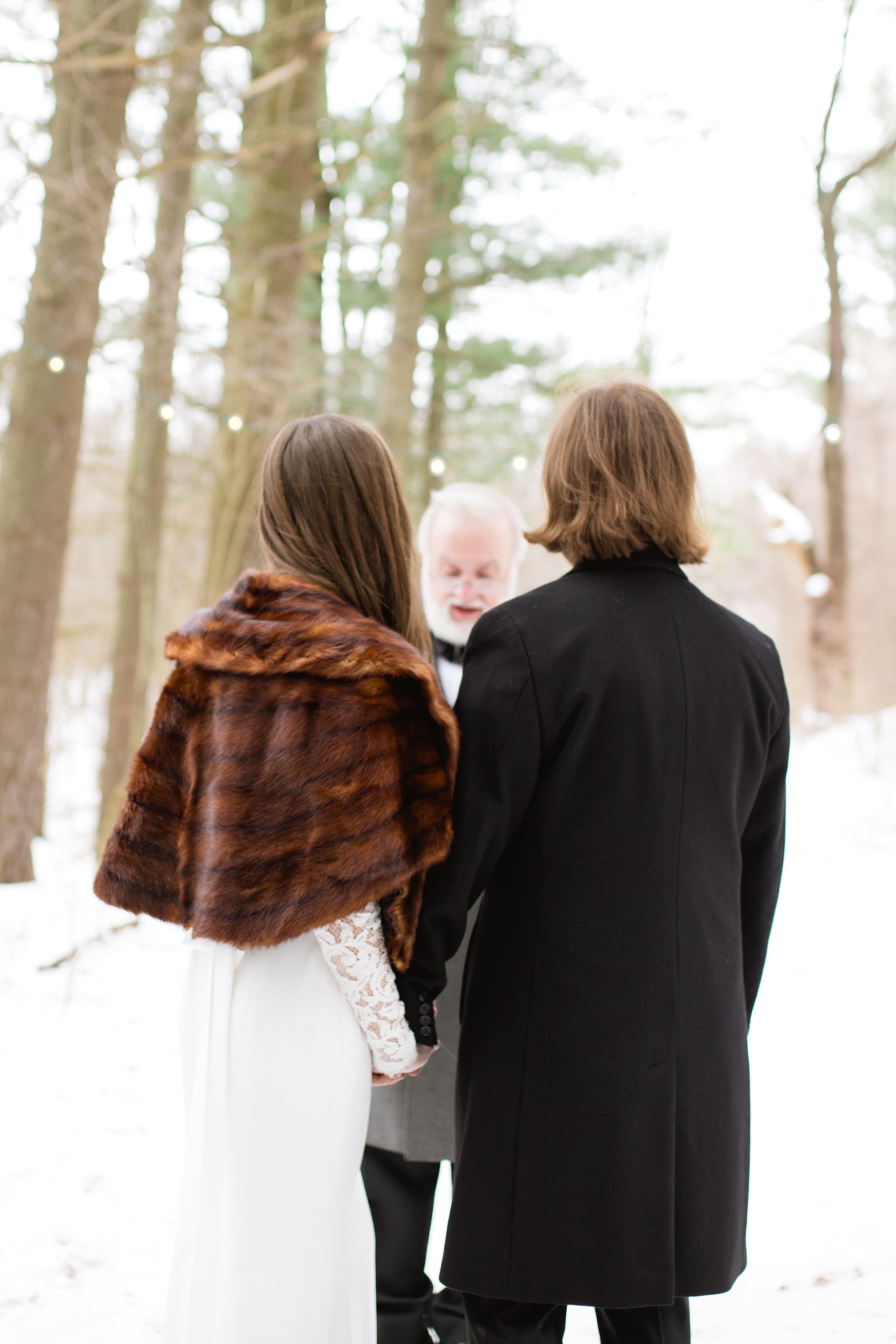 A Michigan Winter Wedding in the woods at Johnson Nature Center in Bloomfield Hills, Michigan by Breanne Rochelle Photography.