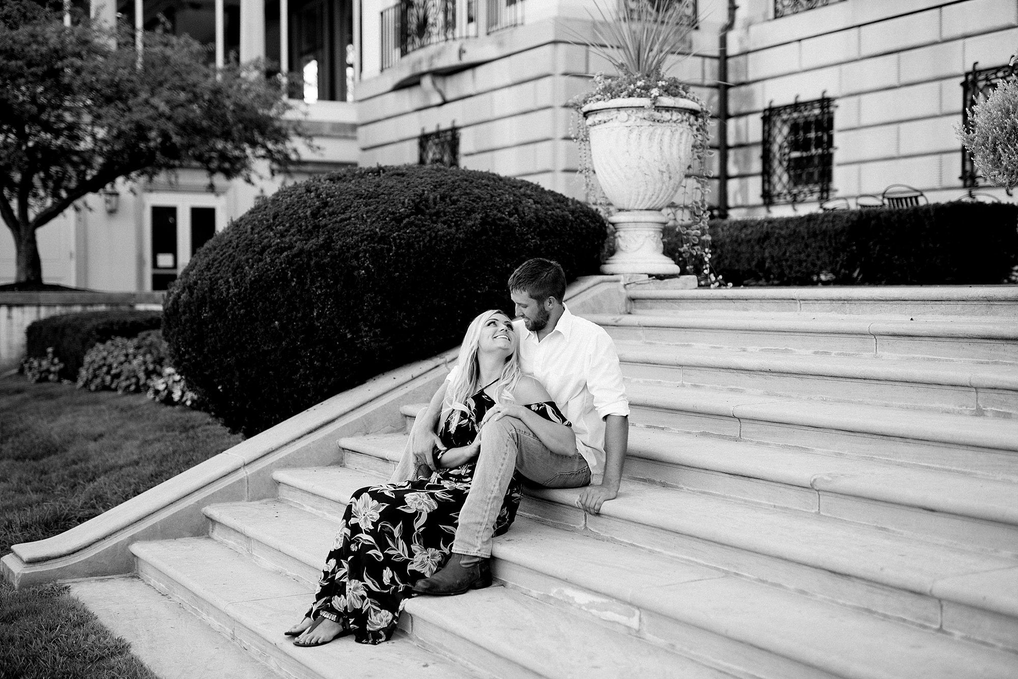 A classic September engagement session filled with blue waters and pretty flowers at The War Grosse Pointe War Memorial by Breanne Rochelle Photography.