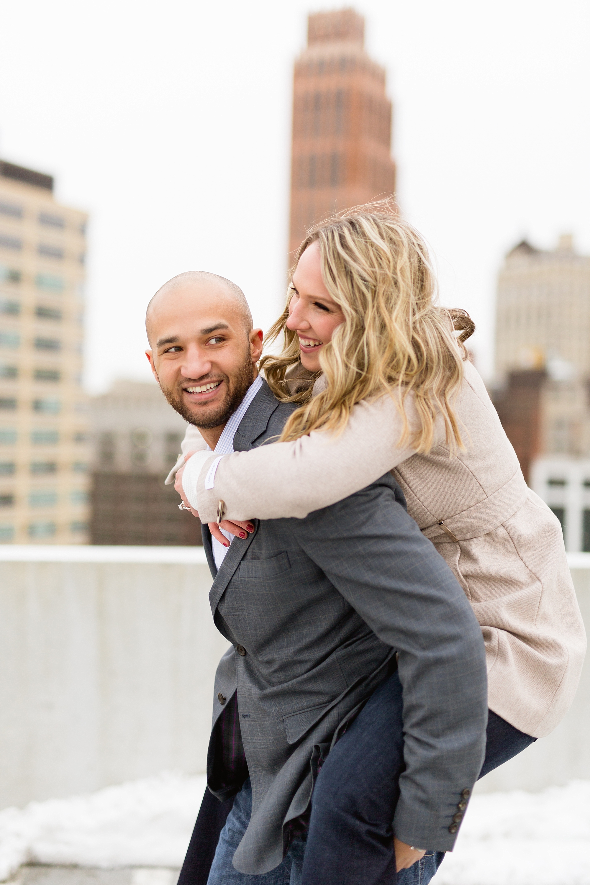 A classic Downtown Detroit winter engagement throughout the city streets by Breanne Rochelle Photography.