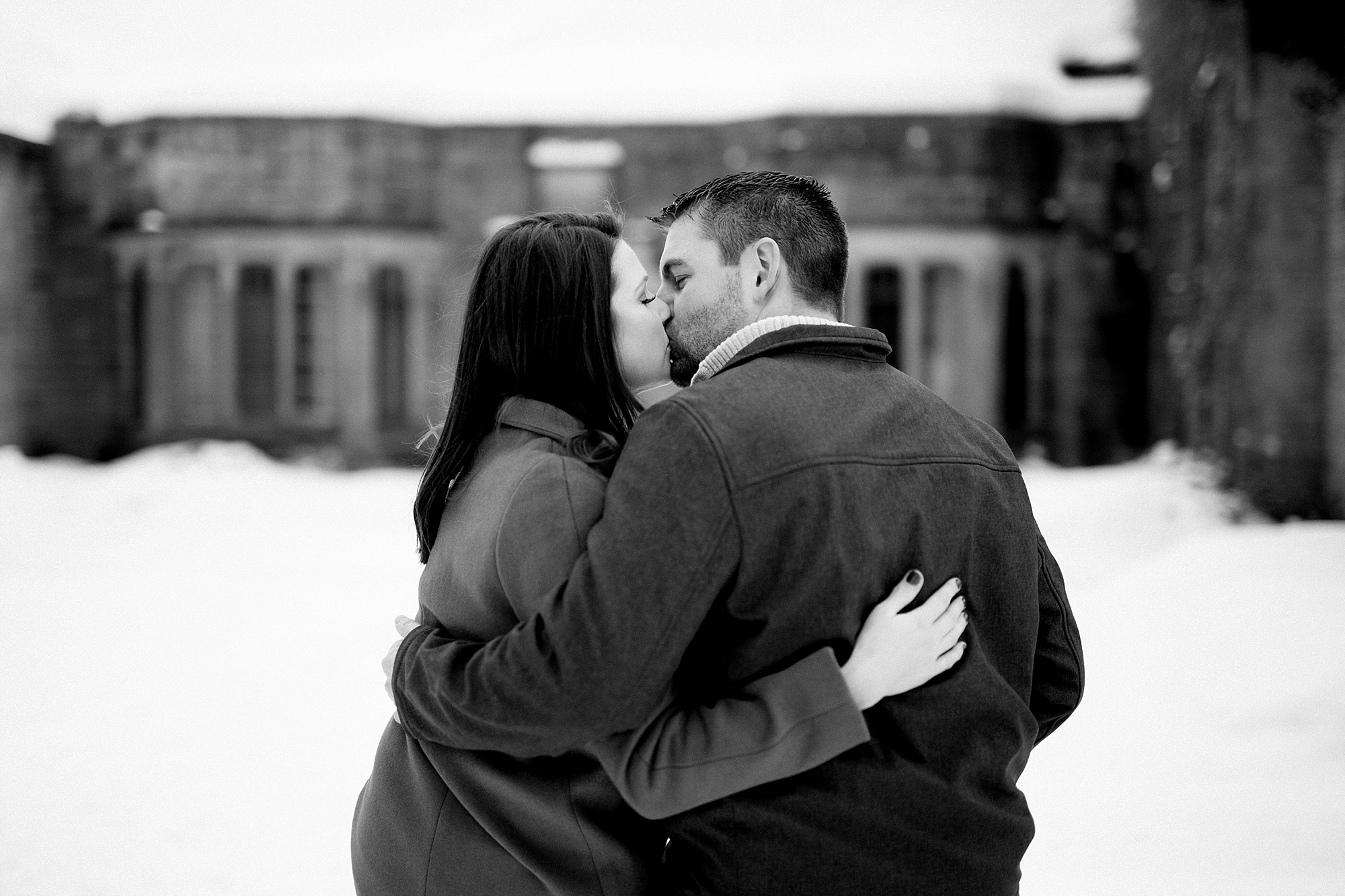 A snowy winter engagement at the Edsel and Eleanor Ford House in Grosse Pointe, Michigan by Breanne Rochelle Photography.
