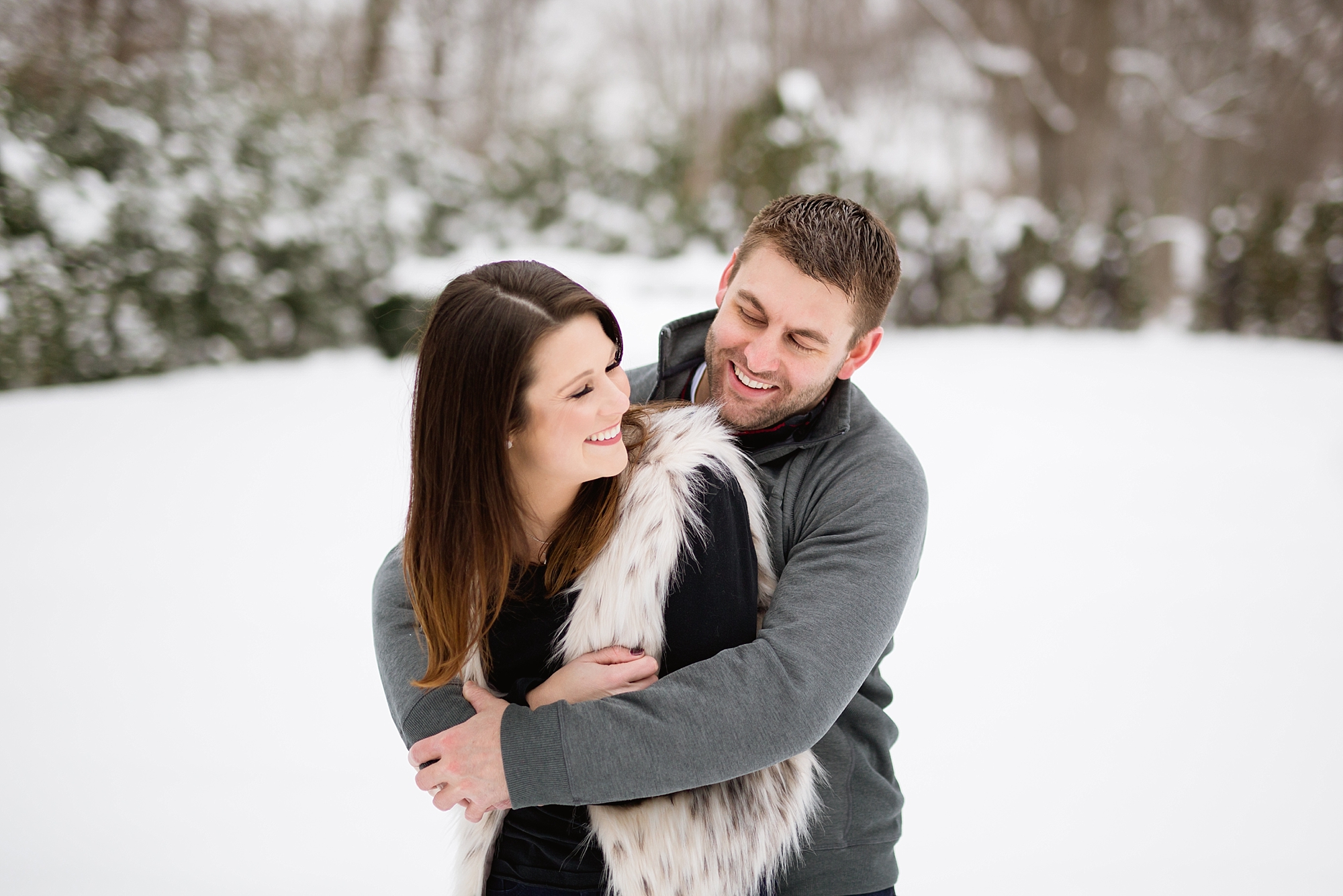 A snowy winter engagement at the Edsel and Eleanor Ford House in Grosse Pointe, Michigan by Breanne Rochelle Photography.