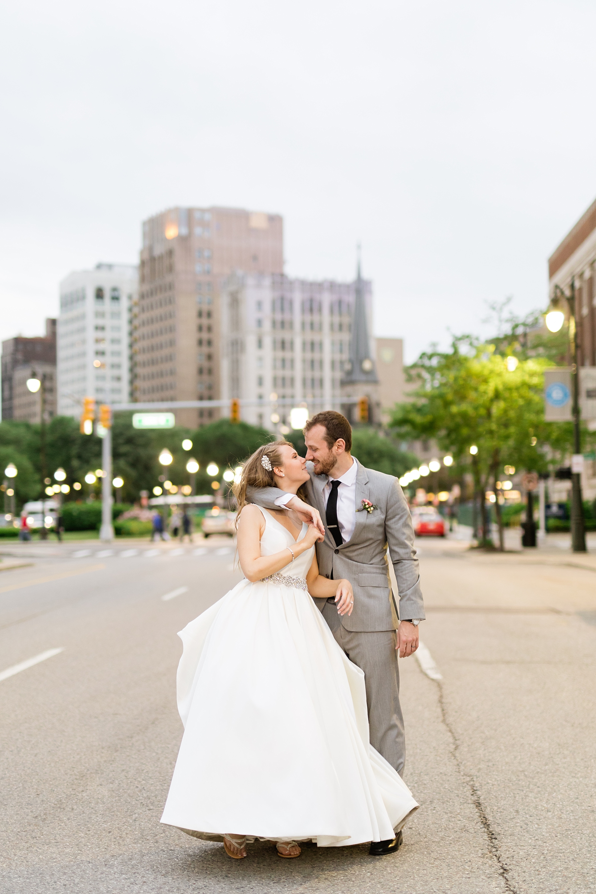 A romantic blush, peach, and maroon June wedding at the Gem Theatre in Detroit, Michigan by Breanne Rochelle Photography.