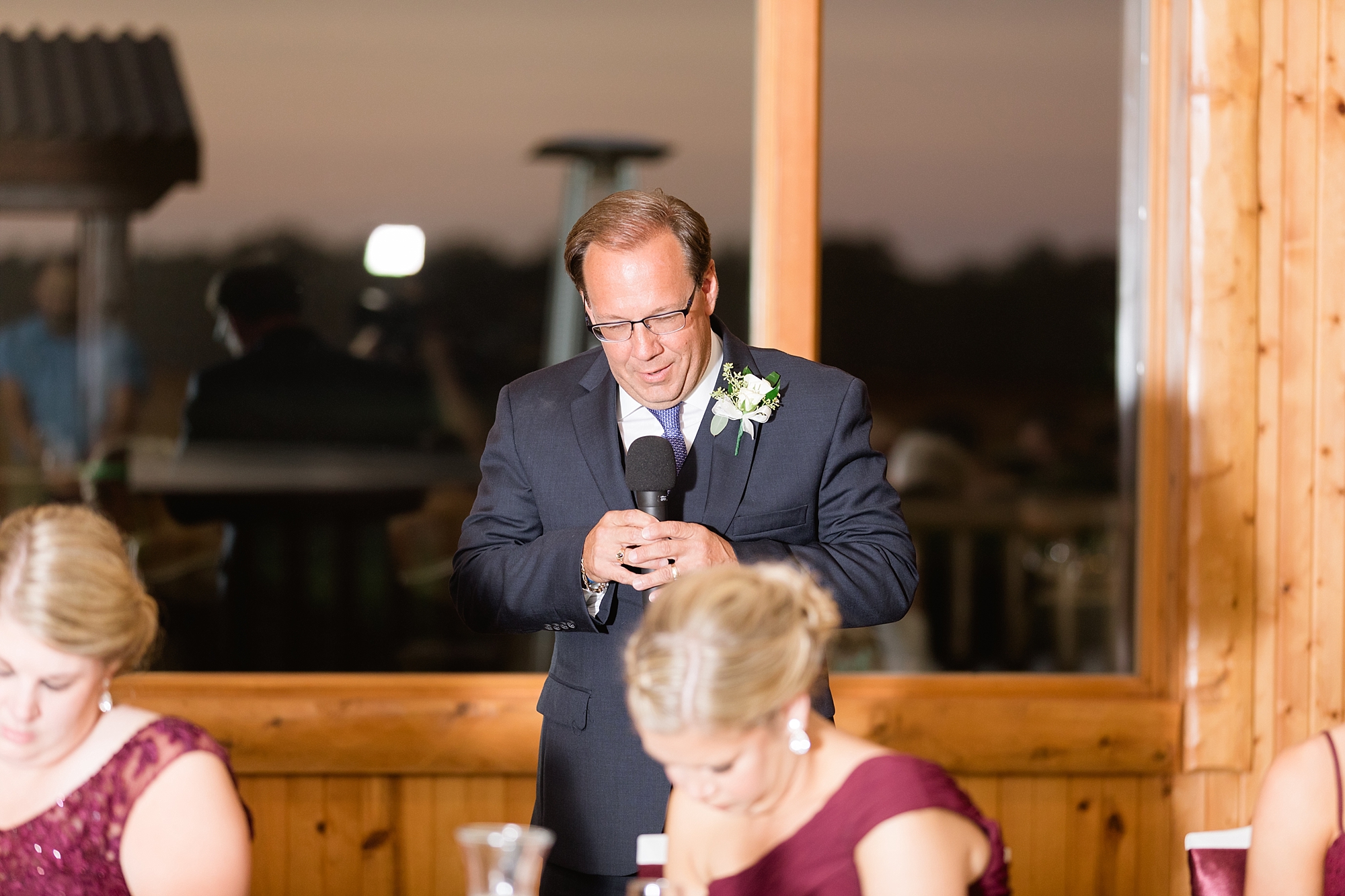 A classic burgundy and navy autumn wedding at Solitude Links in Kimball, Michigan by Breanne Rochelle Photography.