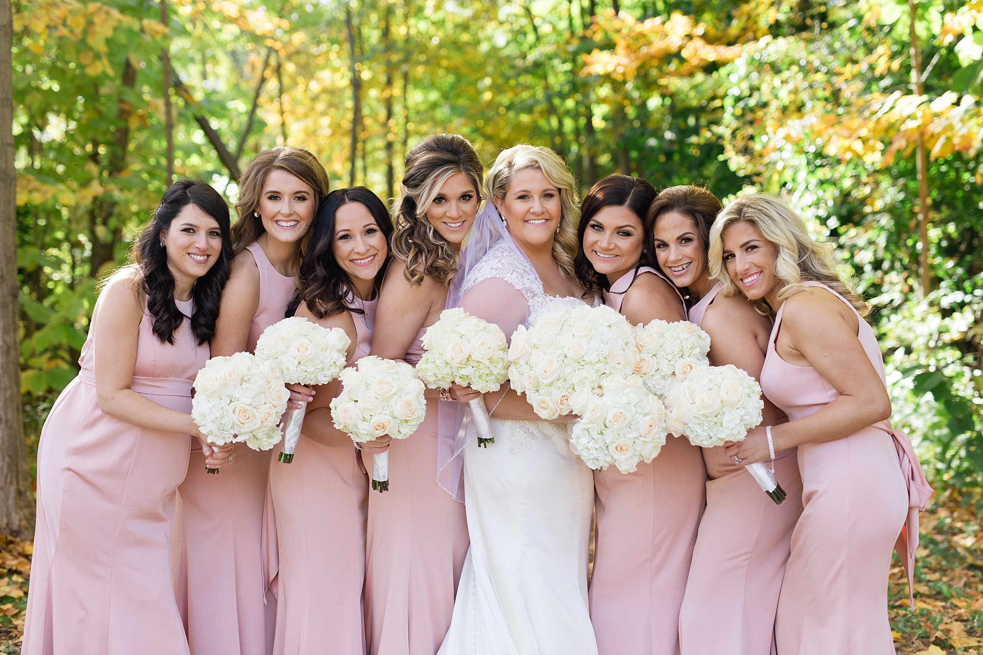 An elegant blush and gold wedding in early October with colorful fall leaves in Metro Detroit, Michigan by Breanne Rochelle Photography.