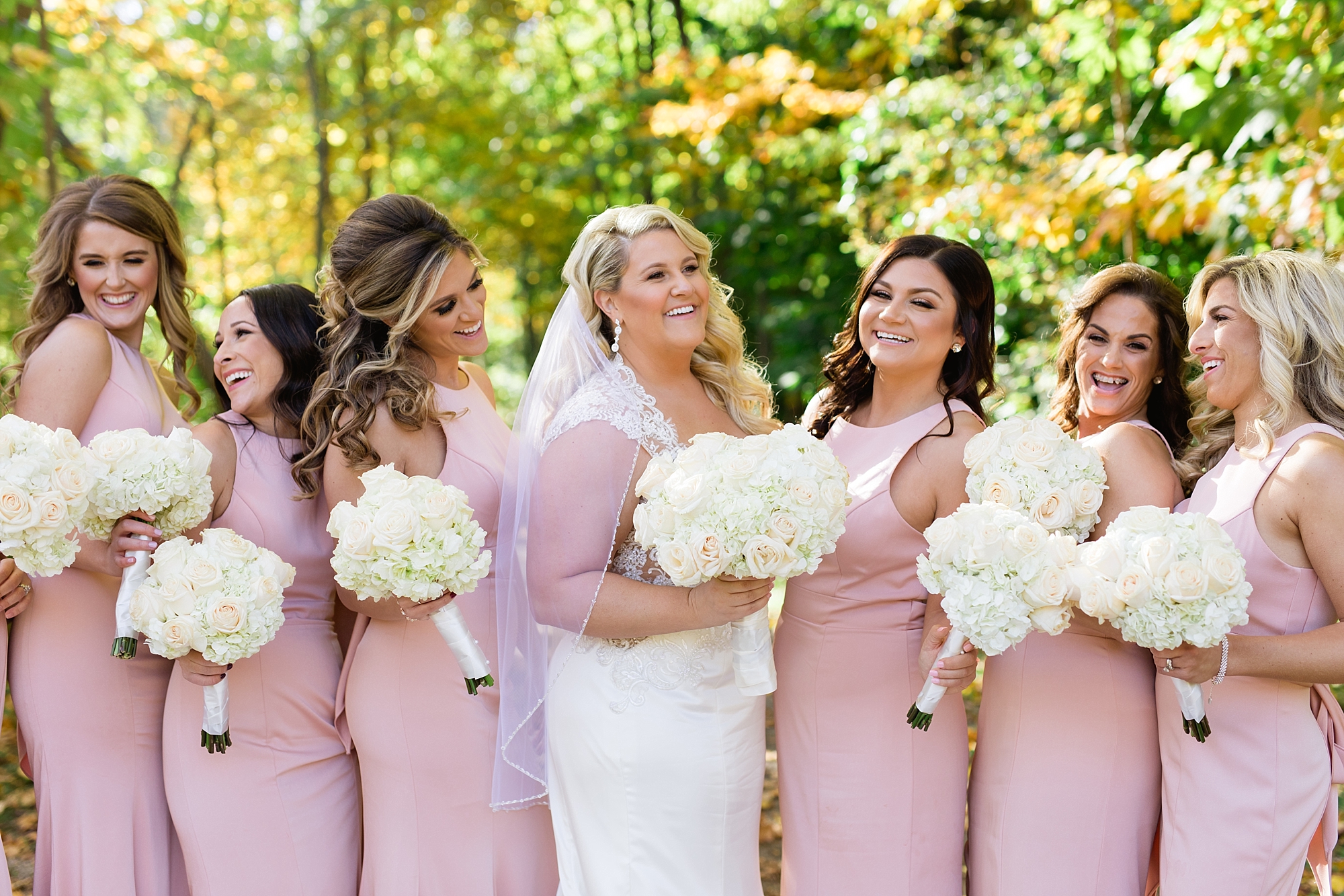 An elegant blush and gold wedding in early October with colorful fall leaves in Metro Detroit, Michigan by Breanne Rochelle Photography.