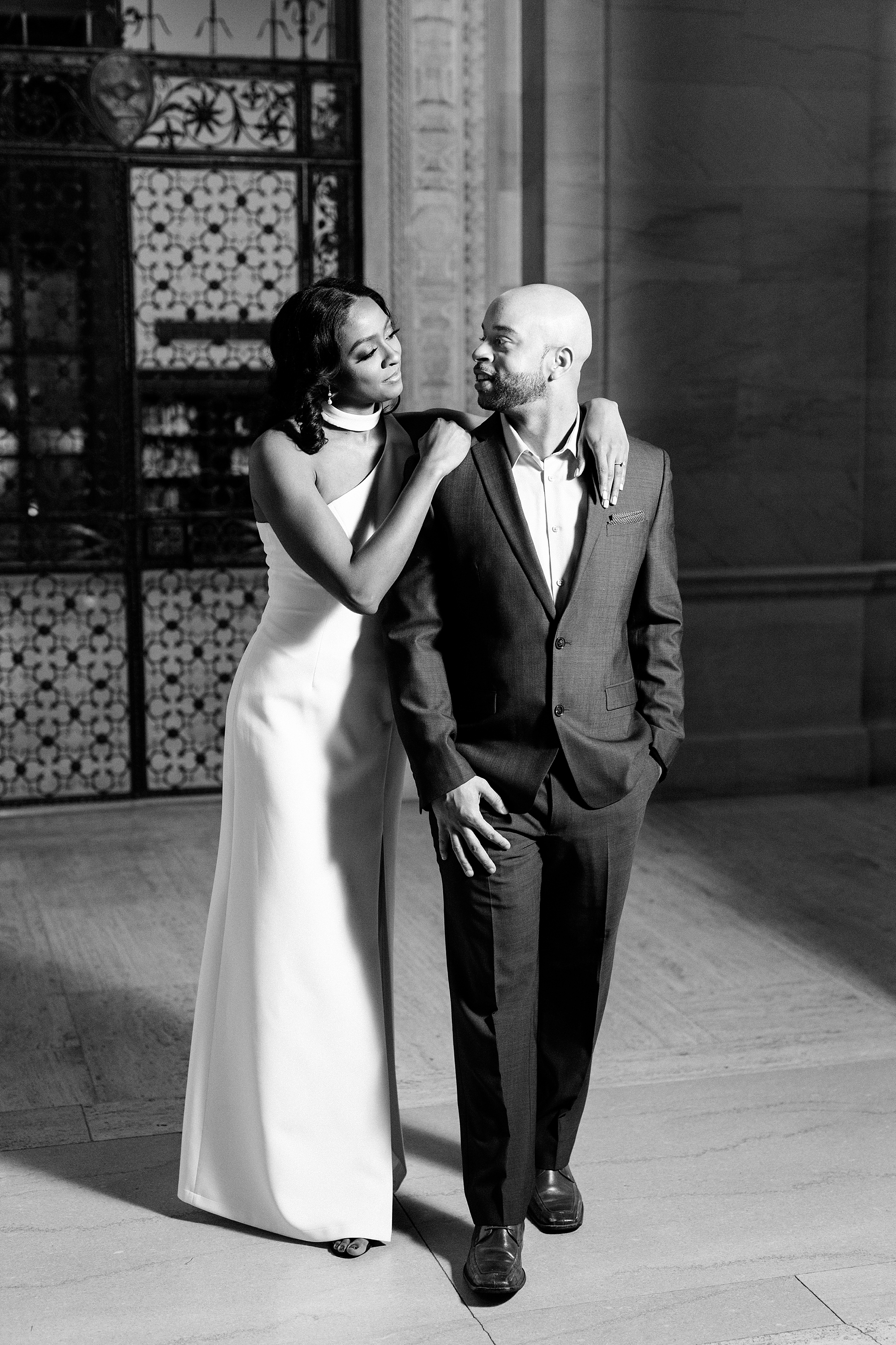 A chic winter engagement session in the city streets of Detroit and the Detroit Public Library by Breanne Rochelle Photography.